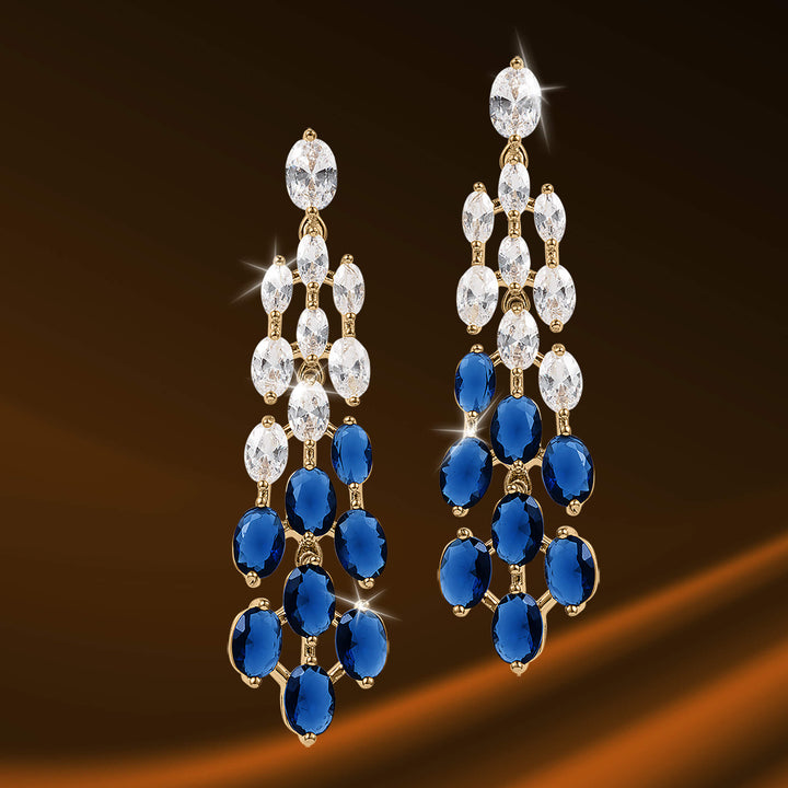 Elegant gold-tone chandelier earrings featuring sparkling clear and deep blue gemstones, part of the Royal Tide Collection jewelry selection.