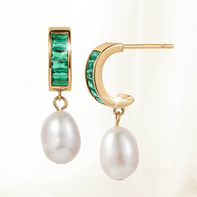 Gold-tone earrings from the Pearl Radiance Collection featuring green rectangular stones and elegant white pearl dangles for a sophisticated jewelry look.