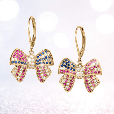 Heritage Bow Earrings featuring gold-tone bow design adorned with pink, blue, and clear sparkling stones, elegant drop style perfect for adding charm to any jewelry collection.