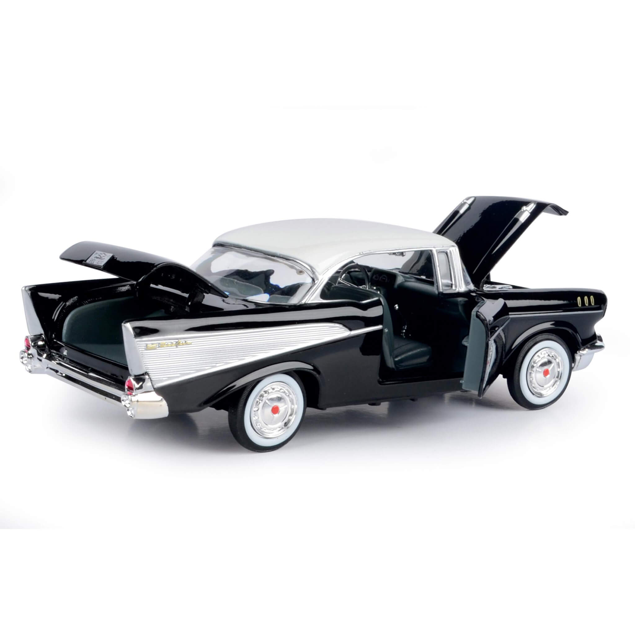 1957 Chevy Bel Air - Black model car with open doors, hood, and trunk showcasing detailed interior and classic two-tone black and white exterior finish.