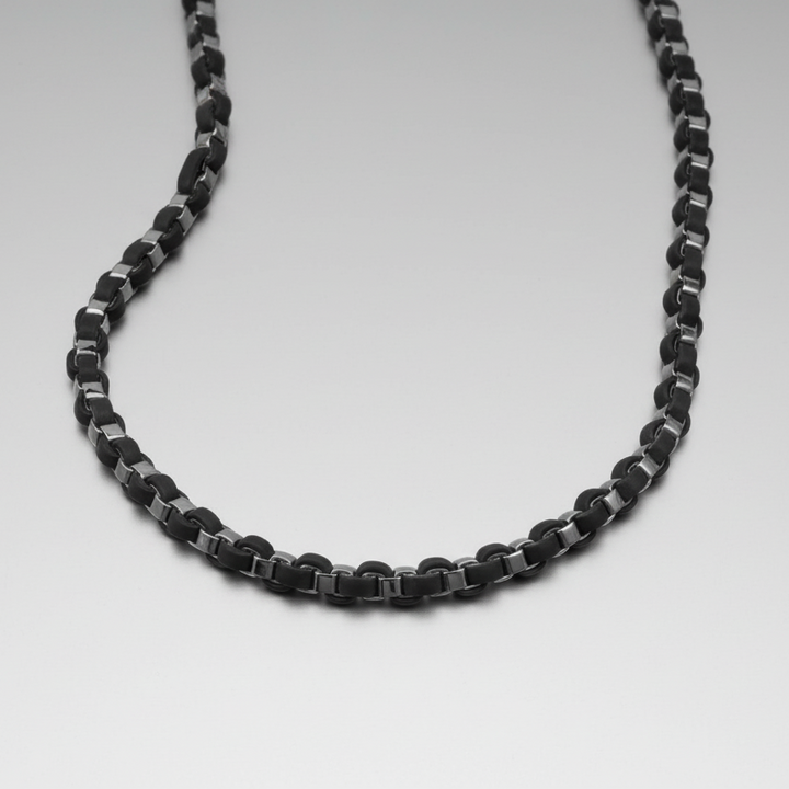 Arizona Steel Men's Necklace featuring a stainless steel chain with a sleek black and gold plating finish, designed for a modern and masculine jewelry style.