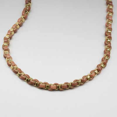 Arizona Gold Men's Necklace featuring stainless steel links intertwined with brown leather for a stylish and contemporary men's jewelry piece.