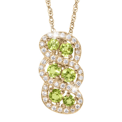 Elysian Peridot Pendant featuring vibrant green peridot stones surrounded by sparkling clear crystals in an elegant gold setting, offered Up To 75% Off Retail.