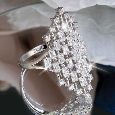 Long Island Cocktail Ring featuring sterling silver with an intricate lattice design adorned with multiple sparkling clear stones, elegant jewelry for women.