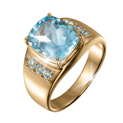 A luxurious Aegean Blue Topaz Men's Ring featuring a large cushion-cut blue topaz center stone set in polished gold with smaller blue topaz accents along the band.