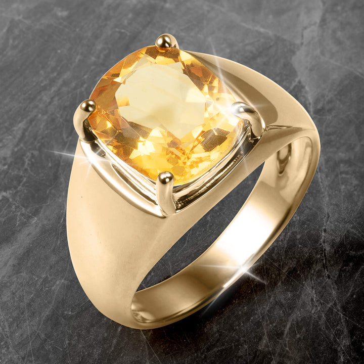 Citrine Royale Ring featuring a faceted golden citrine gemstone in a polished gold tone setting with elegant sculpted shoulders