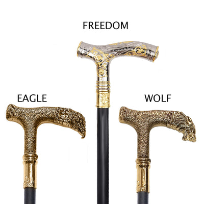 Three decorative walking sticks with 'Freedom', 'Eagle', and 'Wolf' designs on a white background.
