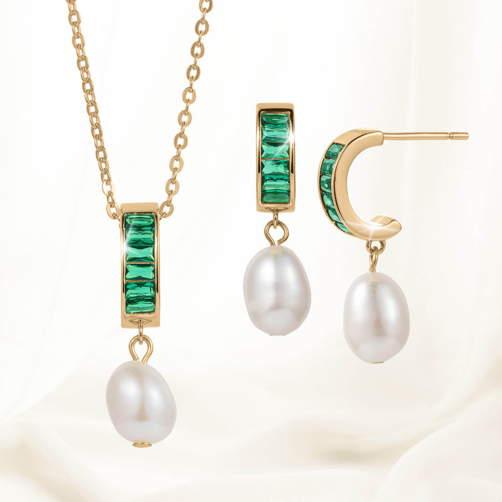 Elegant gold necklace and matching earrings featuring green gemstones and white pearls from the Pearl Radiance Collection, perfect for timeless jewelry enthusiasts.