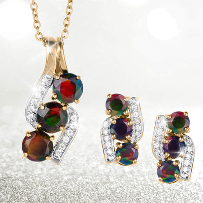 Ember & Eclipse Opal Ladies Collection featuring a gold tone pendant necklace and matching earrings with vivid opal gemstones and sparkling accents Up To 75% Off Retail