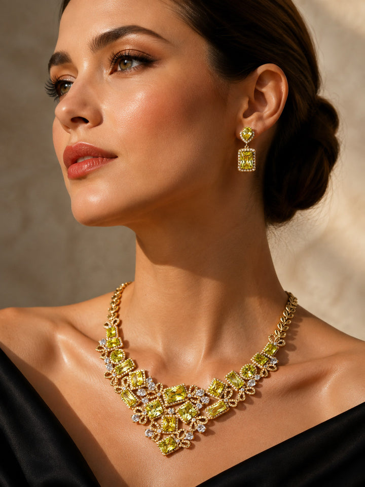 Golden Willow Collection Earrings featuring ornate gold drop earrings styled with a matching statement necklace on a woman Up To 75% Off Retail