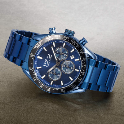Midnight Velocity Men's Watch in sleek blue with chronograph subdials, date display, and stainless steel bracelet, blending sporty design with elegant craftsmanship.