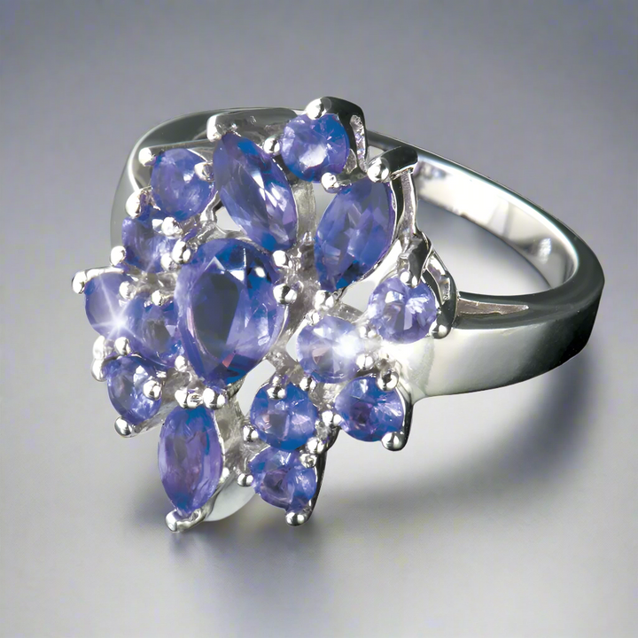 Amethyst Cluster Ring featuring multiple sparkling purple amethyst stones set in a sterling silver band with rhodium plating, designed for female jewelry.
