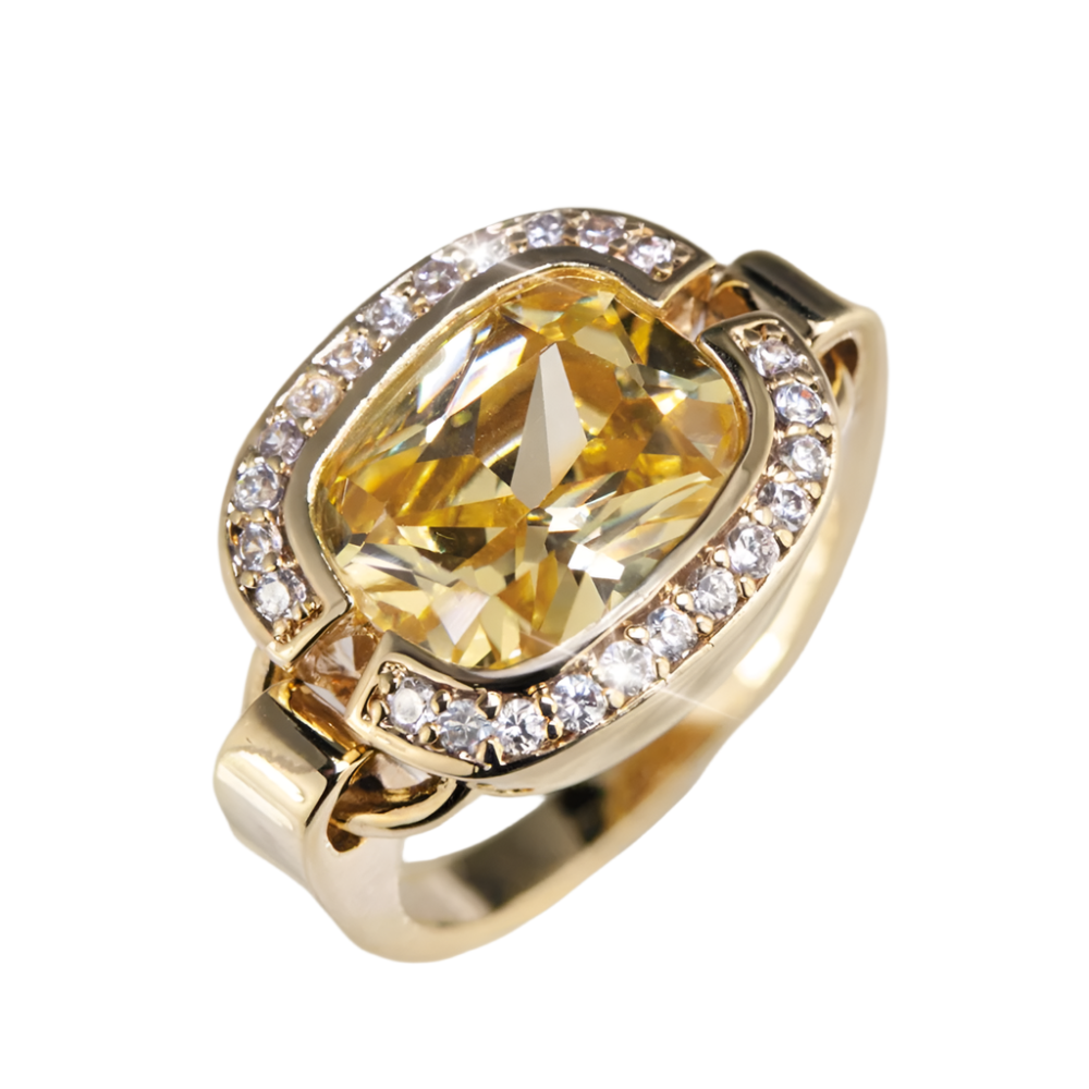 Valenciana Ring featuring a sterling silver band with gold plating, adorned with a large yellow gemstone centerpiece surrounded by sparkling clear crystals for a luxurious female jewelry piece.