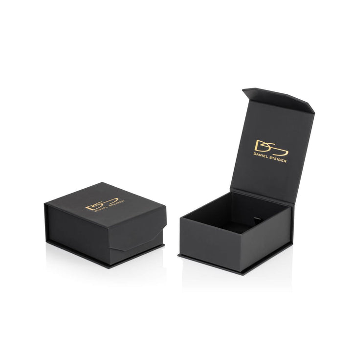 Black elegant jewelry box with gold Daniel Steiger logo, designed for packaging Brilliant Birthstones Earrings November made from sterling silver with rhodium plating for female customers.