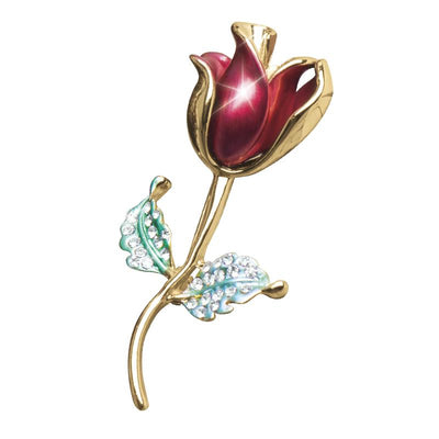 Rosea Brooch featuring a gold-tone stem with a deep red rosebud and green leaves adorned with sparkling crystals, designed for female jewelry enthusiasts.