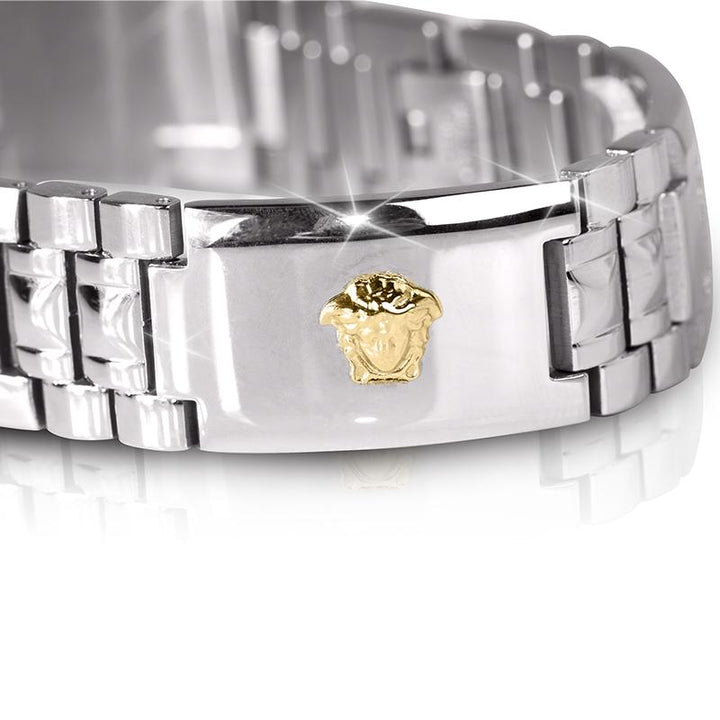 Medussa Bracelet close-up showing two-tone stainless steel design with a polished finish and detailed gold Medusa emblem on the clasp, a stylish male jewelry piece.