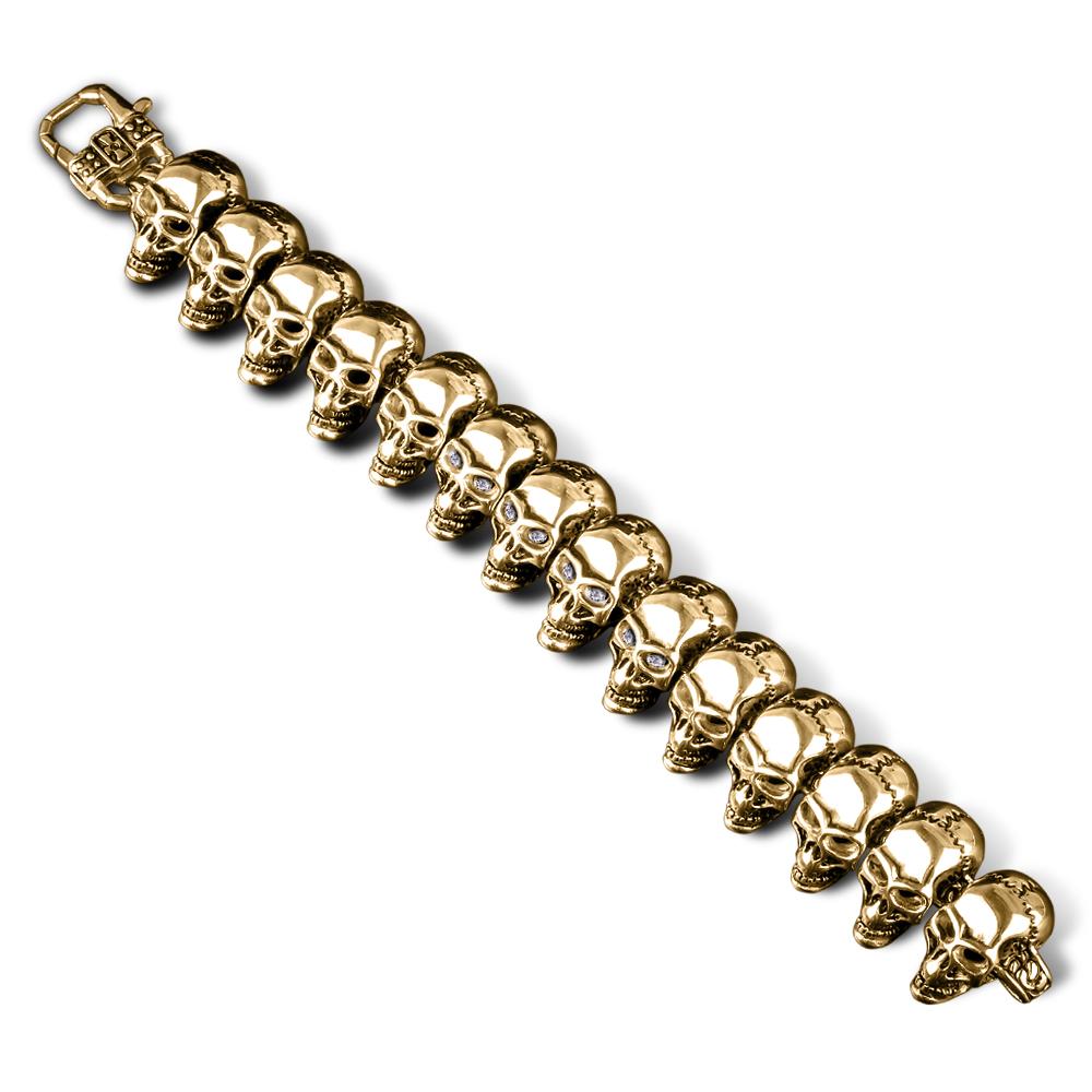 Skullhead Gold Bracelet featuring linked gold stainless steel skulls designed for men, showcasing bold and edgy jewelry craftsmanship.