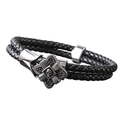 Men's Midnight Skull Steel Bracelet featuring a stainless steel skull centerpiece and black braided leather band, designed for bold male jewelry style.