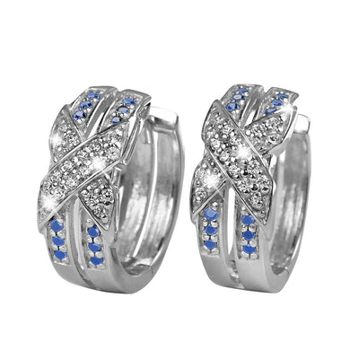 Embrace Rhodium Earrings crafted from sterling silver with rhodium plating, featuring an elegant design accented by sparkling clear and blue stones for women’s jewelry.