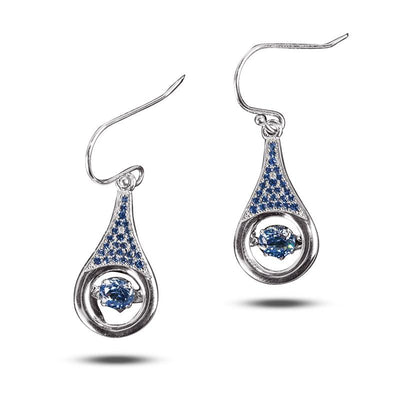Indigo Dancing Earrings featuring sterling silver with rhodium plating, showcasing indigo blue stones in a teardrop design for elegant female jewelry.