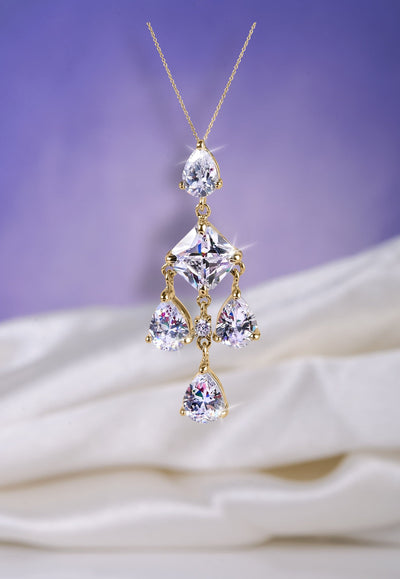 Ice Chandelier Pendant featuring sparkling clear stones set in sterling silver with gold plating, designed as an elegant necklace for women.