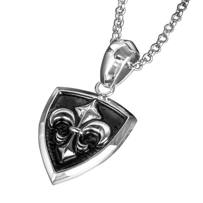 Grand Canyon Steel Pendant featuring a stainless steel shield design with a raised fleur-de-lis emblem, suspended from a matching link chain necklace for men.
