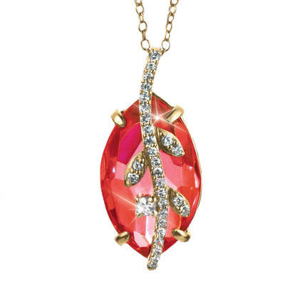 Fire Vine Pendant featuring a sterling silver base plated in gold, showcasing a vibrant red gemstone accented with sparkling crystals, designed for women’s jewelry.