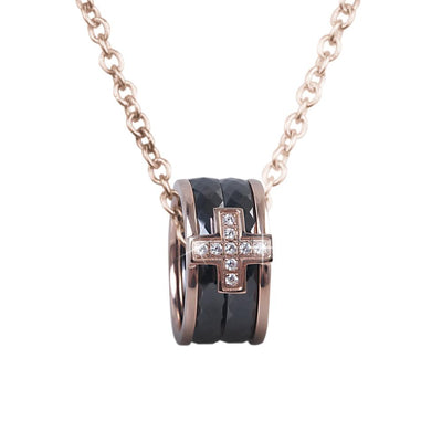 Ceramica Cross Pendant featuring a rose gold plated stainless steel chain with a black ceramic ring and a small crystal-studded cross, designed for men’s jewelry.