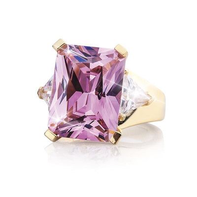 Argyle Trilogy Ring featuring a large rectangular pink gemstone set in gold-plated sterling silver, accented with two clear triangular stones, designed for women’s jewelry.