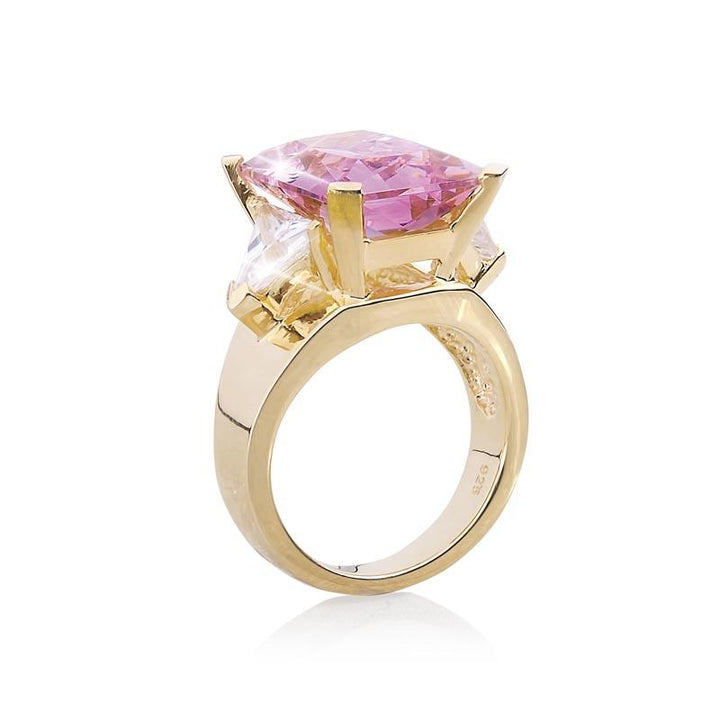Argyle Trilogy Ring featuring a large pink gemstone set in gold-plated sterling silver, designed for women seeking elegant and luxurious jewelry.