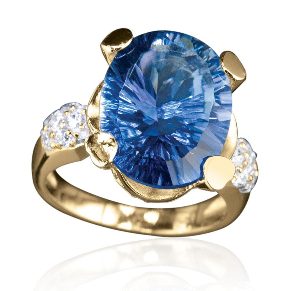 Azure Ring featuring a large blue gemstone set in gold-plated sterling silver, accented by small sparkling stones, designed for women’s elegant jewelry collections.