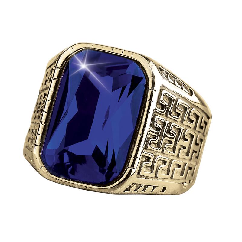 Blue Knight Ring featuring a large rectangular blue gemstone set in gold-plated stainless steel with intricate geometric detailing, designed for men’s jewelry collections.
