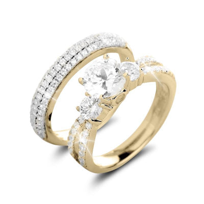 Serenade Duo Bridal Ring in sterling silver with gold plating, featuring a large central gemstone and multiple smaller sparkling stones for an elegant bridal jewelry look.