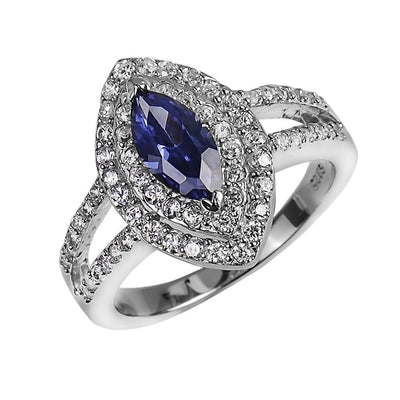 Constantina Ring featuring a marquise-cut blue gemstone set in rhodium-plated sterling silver with dual rows of sparkling clear stones, designed for women’s jewelry collections.