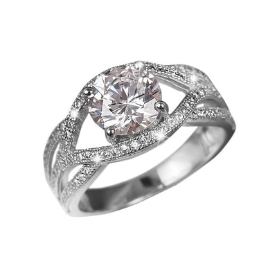 Astor Ring featuring a sterling silver band with rhodium plating, showcasing a large central clear gemstone and intricate small accent stones for elegant female jewelry.