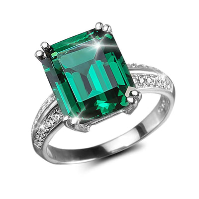 Verdana Ring featuring a large rectangular green gemstone set in sterling silver with rhodium plating, designed for women, accented with small sparkling stones on the band.