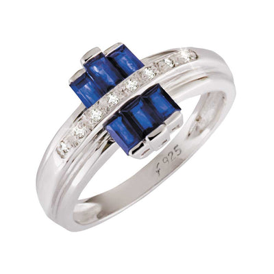 Jazz Ring featuring sterling silver band accented with rectangular blue sapphire gemstones and a row of small clear stones, designed for female jewelry enthusiasts.