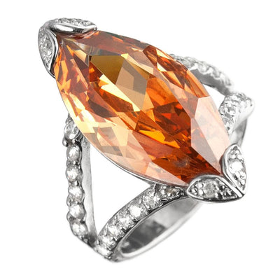 Marquise Champagne Ring featuring a large marquise-cut champagne gemstone set in sterling silver with rhodium plating and accented with small sparkling stones, designed for women.