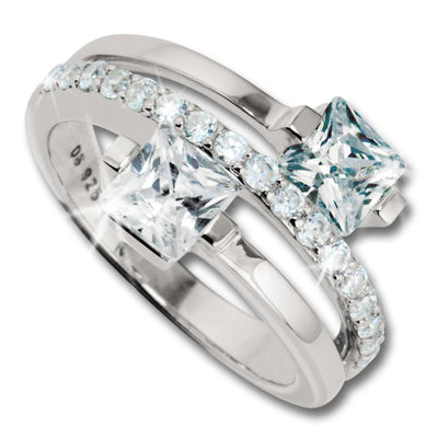 Sterling silver Miami Ring for female featuring two large square-cut clear gemstones set in a split band design adorned with smaller round sparkling stones.