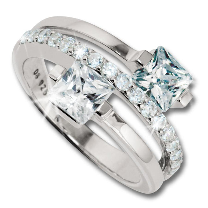 Sterling silver Miami Ring for female featuring two large square-cut clear gemstones set in a split band design adorned with smaller round sparkling stones.