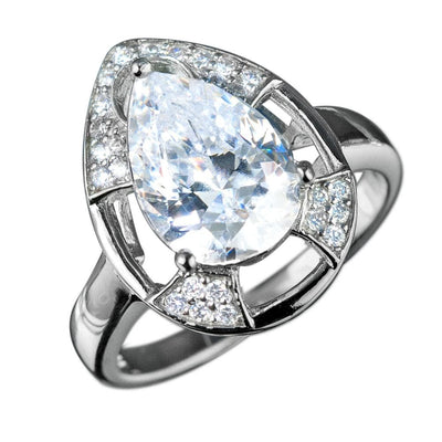 Mandalay Pear Ring featuring a pear-shaped clear gemstone set in sterling silver with a sleek band and accent stones, designed for women’s jewelry collection.