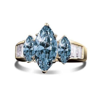 Capri Marquise Ring featuring a gold-plated sterling silver band with three marquise-cut blue gemstones, designed for female jewelry collectors seeking elegant rings.
