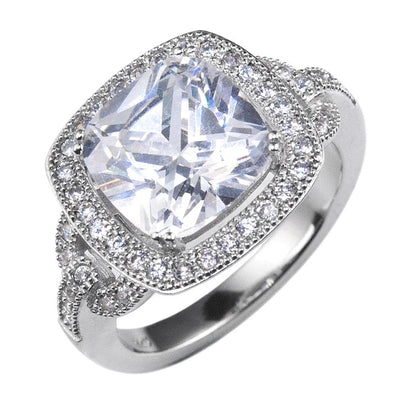 Heirloom Ring in sterling silver with rhodium plating, featuring a large square-cut central stone surrounded by smaller sparkling stones, designed for women’s jewelry collections.