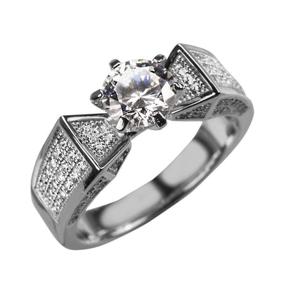 Sterling silver Star Solitaire Ring for women with rhodium plating featuring a prominent round solitaire stone and intricate side detailing, elegant jewelry piece.