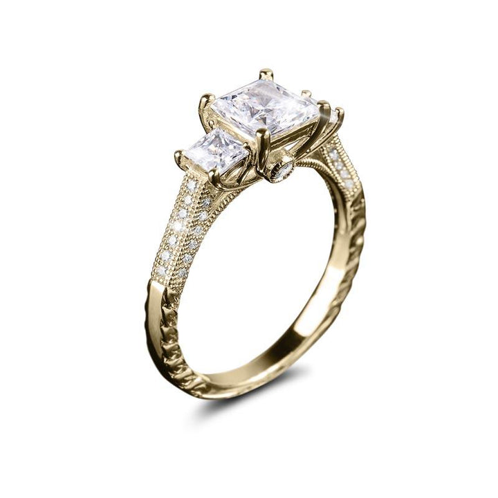 Lyla Princess Trilogy Ring in sterling silver with gold plating, featuring three square-cut clear gemstones and intricate detailing along the band, designed for women’s jewelry collectors.