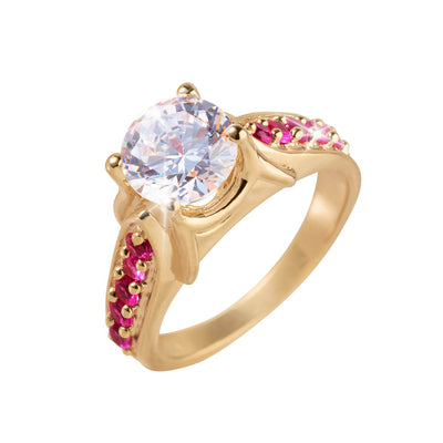 Salamanca Ring featuring a large clear gemstone centerpiece set in gold-plated sterling silver with vibrant pink stones accenting the band, designed for women’s jewelry.