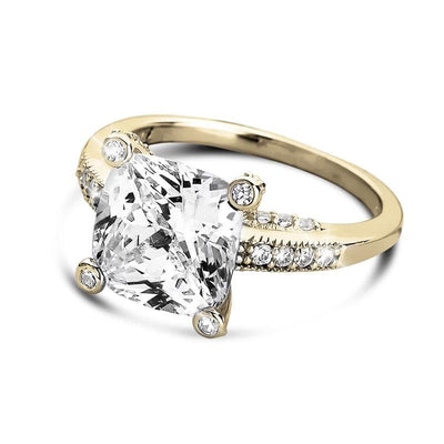Fiji Golden Princess Ring featuring a large square-cut clear gemstone set in sterling silver with gold plating and adorned with smaller sparkling stones along the band.
