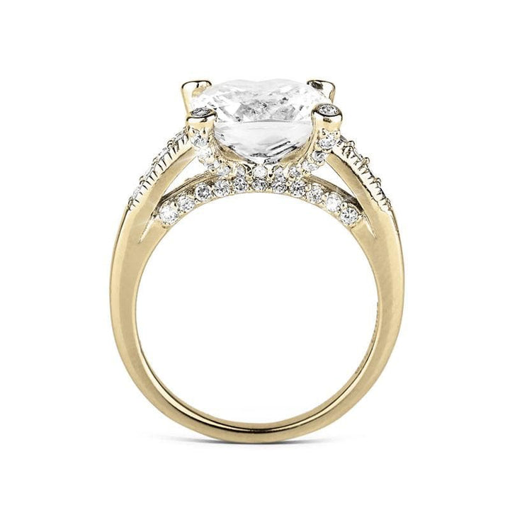 Fiji Golden Princess Ring featuring a sterling silver band plated in gold, designed for females, adorned with a large clear gemstone and smaller accent stones for added sparkle.