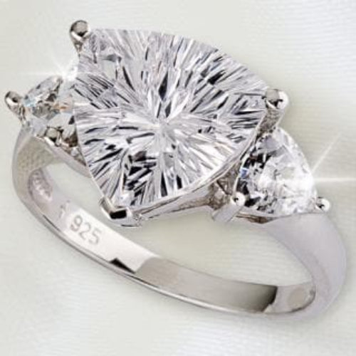 Trillion Jewelry Ring featuring a sterling silver band with a large trillion-cut center stone flanked by two smaller triangular stones, designed for women’s jewelry collection.