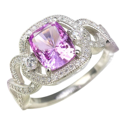 Lola Ring crafted in sterling silver with rhodium plating, featuring a vibrant rectangular pink gemstone centerpiece accented by sparkling round clear stones in an elegant design for women.